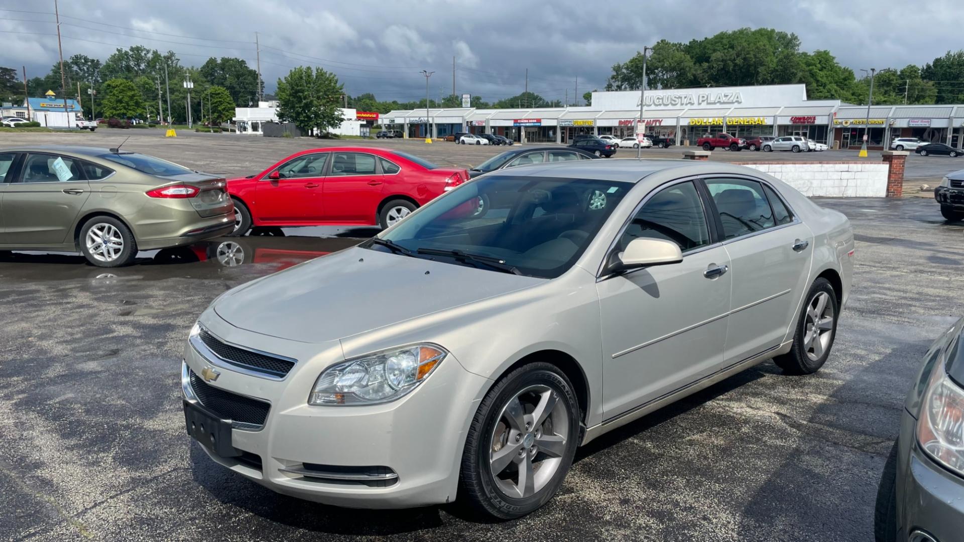 2012 Gold /GRAY Chevrolet Malibu 1LT (1G1ZC5E0XCF) with an 2.4L L4 DOHC 16V engine, 6-Speed Automatic transmission, located at 2710A Westlane Rd., Indianapolis, IN, 46268, (317) 291-2000, 39.885670, -86.208160 - Photo#0